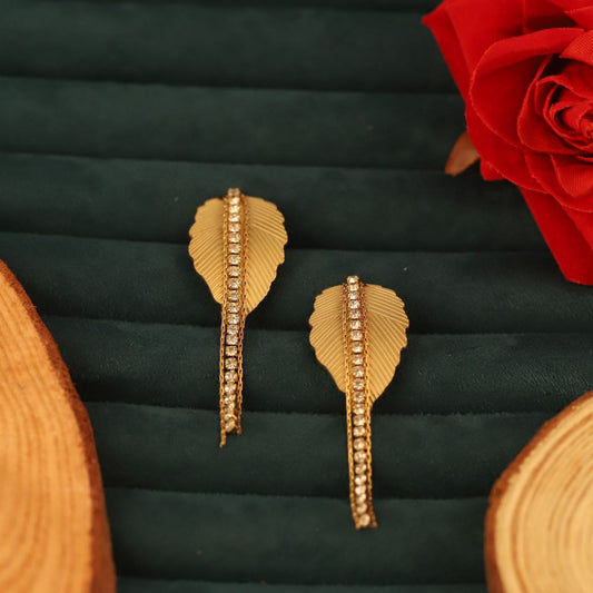 Elevate your accessory game with our stunning 22k gold plated leaf earrings CHARMORA BY ROHI